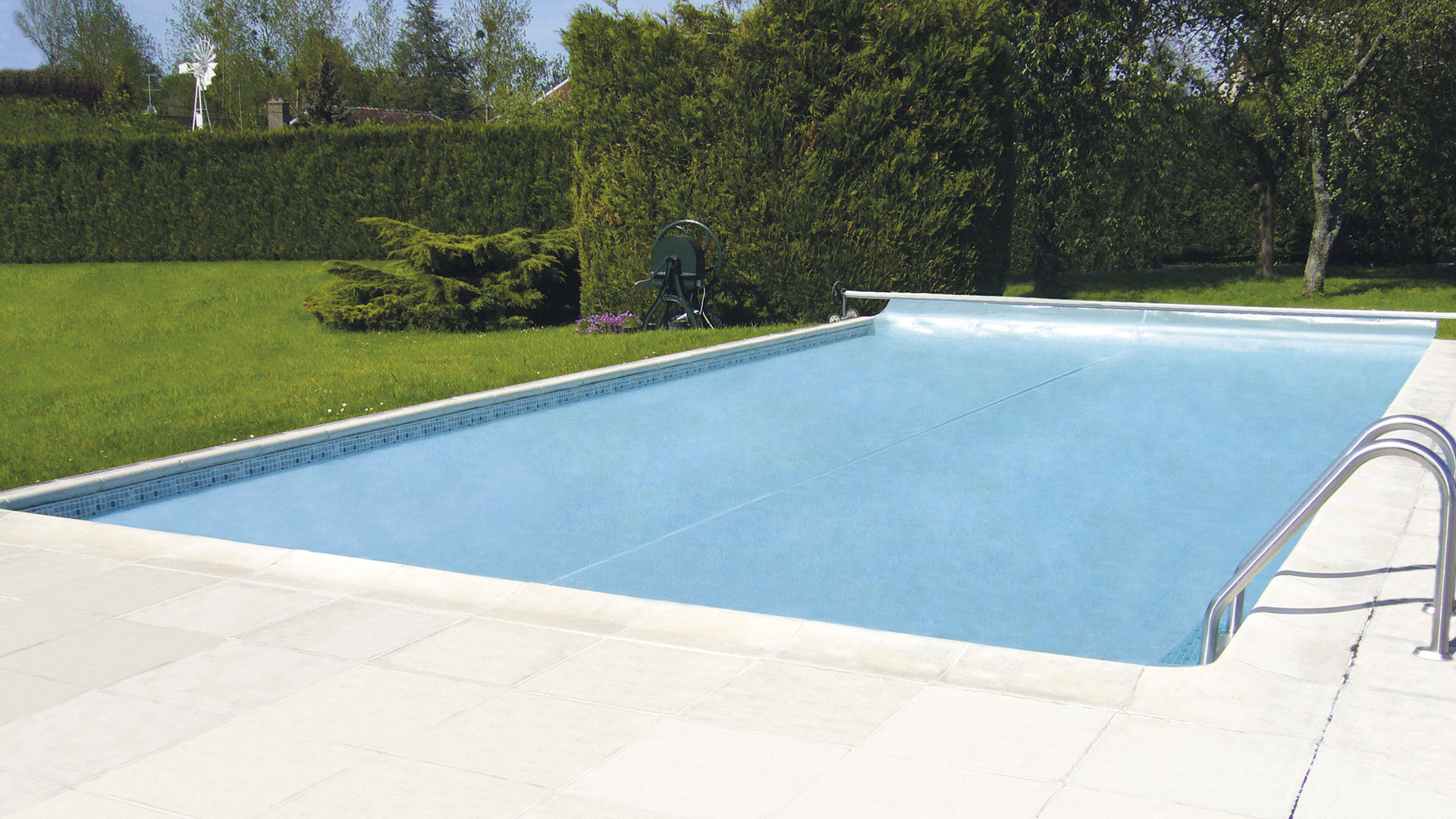 Bâche à bulles piscine chauffage solaire GeoBubble économie énergie Genève et Vaud